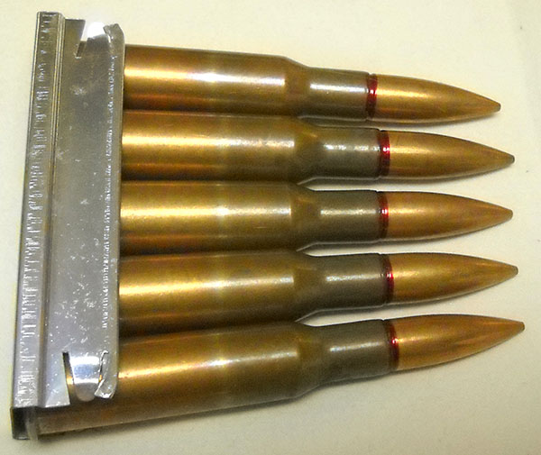 Mosin-Nagant stripper clip with 5 rounds of 7.62x54mmR ammunition